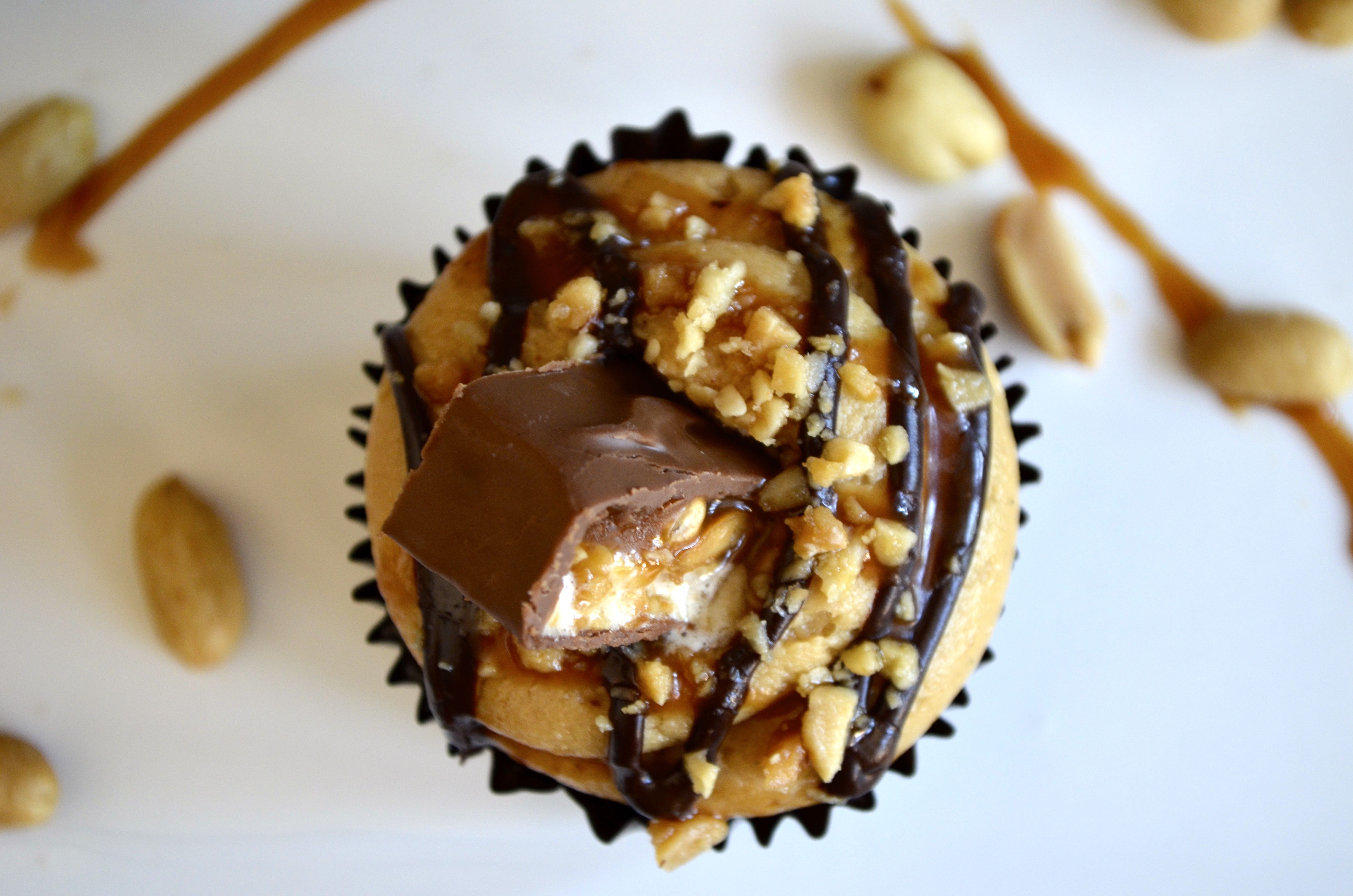 Snickers cupcakes at www.laughlovekiss.com